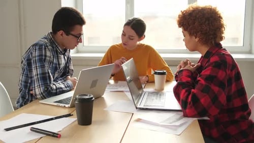 Team at Work Office Meeting Group of Young Business People Working Together in Creative Office Happy