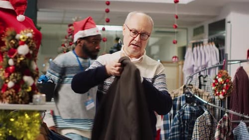 Senior Man Shopping for Clothing at Christmas