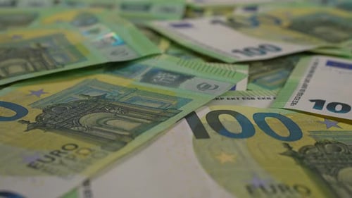 Close Up of Green and Yellow Euro Banknotes