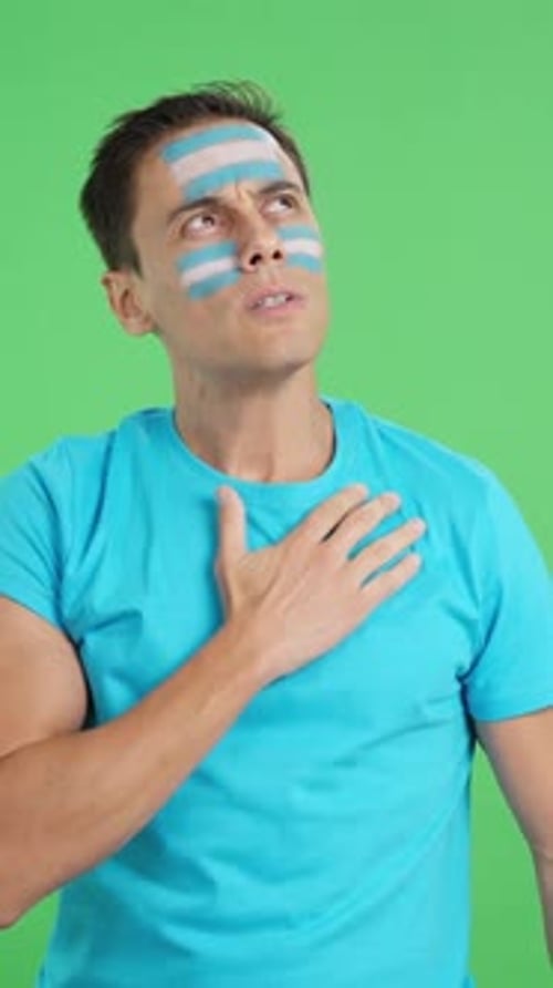 Man Listening to the Argentina National Anthem with Solemnity