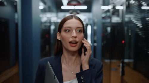 Closeup Positive Business Woman Talking Smartphone in Office Interior. Smiling Businesswoman Calling