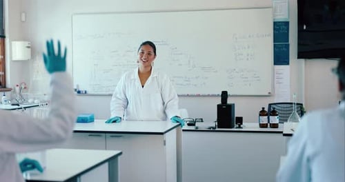Confident Teacher Explaining Science in Classroom Lab