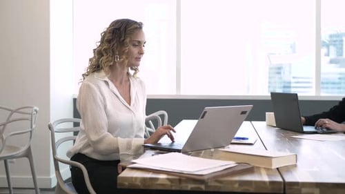 Focused Businesswoman Working at Laptop in Coworking Space Office Adult