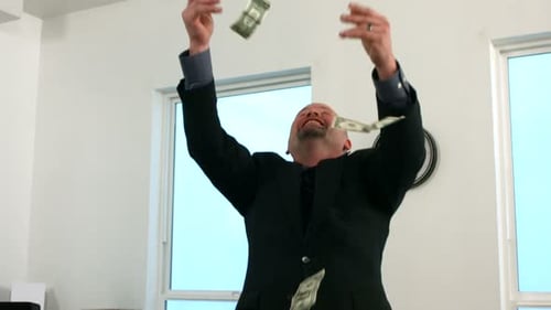 Businessman Catching Money, Slow Motion