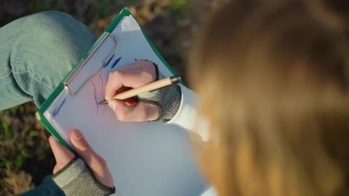 Young Woman Sketches Lively Figure in Park Environment Student Practicing Rapid Gesture Drawing