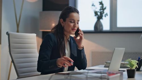 Smiling Executive Speaking Mobile Phone in Modern Office Joyful Woman Call