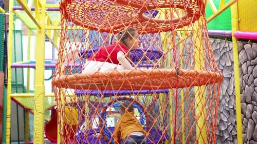 Kids Play in the Children's Entertainment Center Children's Playroom