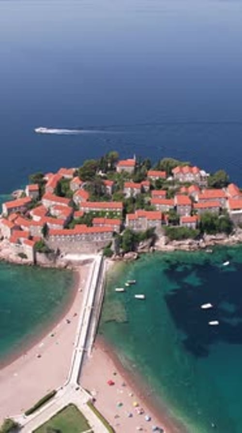 Sveti Stefan, Montenegro. Vertical Drone Shot of Small Resort Island in Adriatic Sea