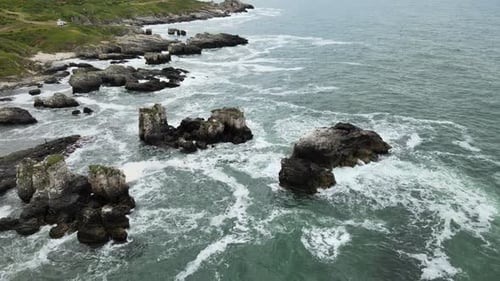 aerial waves rocks sea
