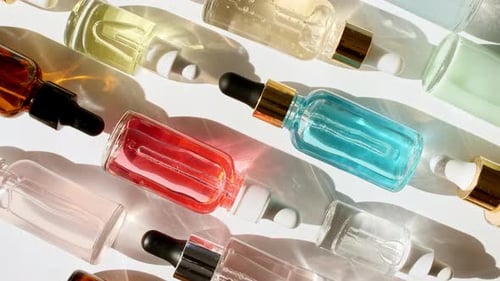 Colorful Serums in Glass Bottles for Beauty