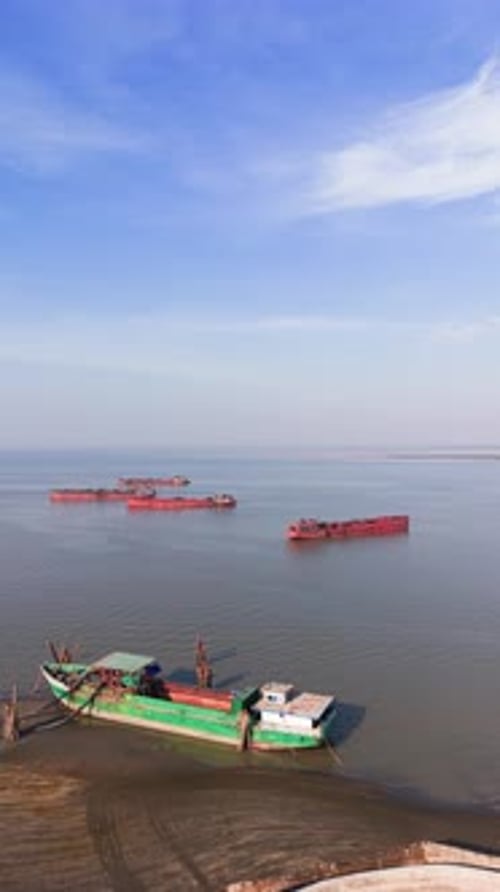 Aerial (Vertical ) View of the Ships Near the Port During Low Tide in Vietnam.