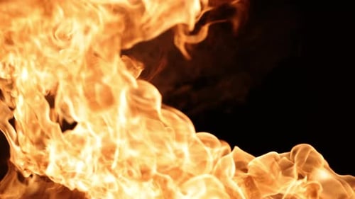 Dramatic Flames Erupting on Black Background for Visual Effects