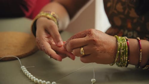 Element of Traditional Indian Hindu Wedding Handmade Jewelry Making Close Up Footage