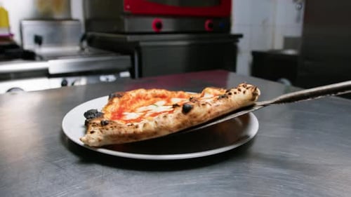 Pizza On The Dish Of A Pizzeria From Napoli