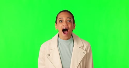 Face, green screen and woman with a smile, surprise and announcement on a studio background