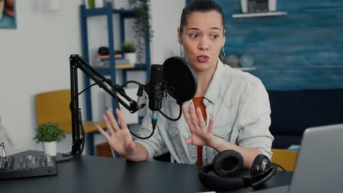 Woman Talking into Microphone for Podcast