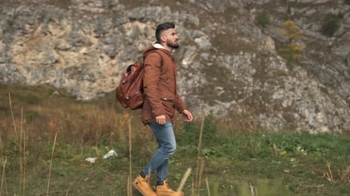 Hiker Tourist Traveler Man with Backpack at Mountains Outdoors River Hiking Travel Landscape Nature