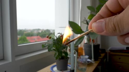 Burning Matchstick Held Indoors Close Up