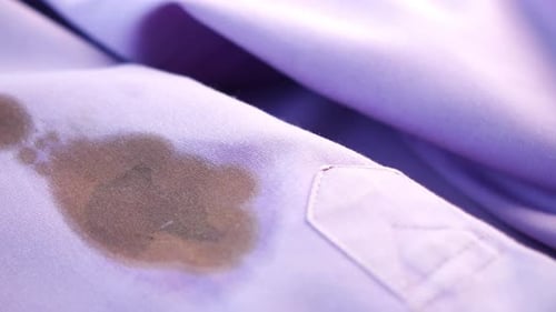 Oil Stain on Purple Color Cloth
