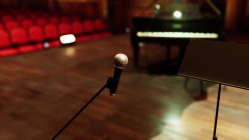 Empty Concert Stage with Microphone and Grand Piano