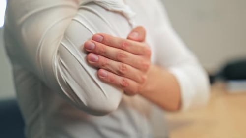 Painful Elbow Joint Massaged By Hand