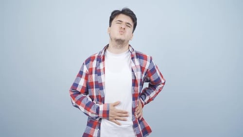 Man experiencing stomachache.