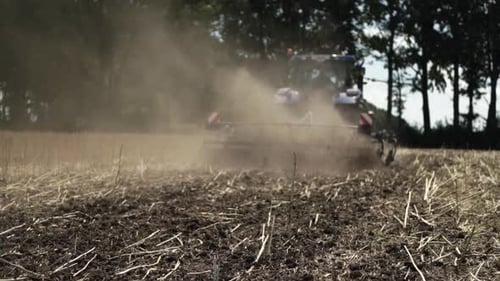 Tractor working on the field doing tillage