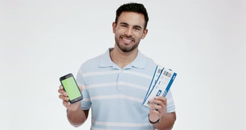 Happy man, phone mockup and flight tickets in travel, accommodation or boarding pass against a grey