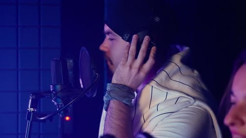 Young Singers Singing a Duet in Recording Studio