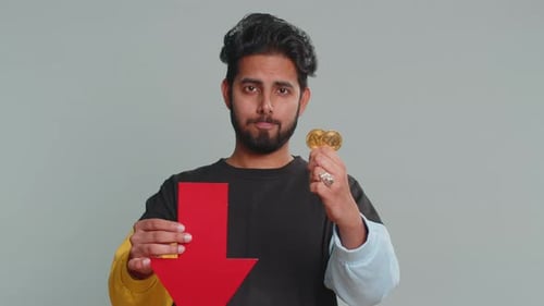 Upset Man Showing Red Arrow Pointing Down Fall of Cryptocurrency Stock Market Mining Bitcoins BTC