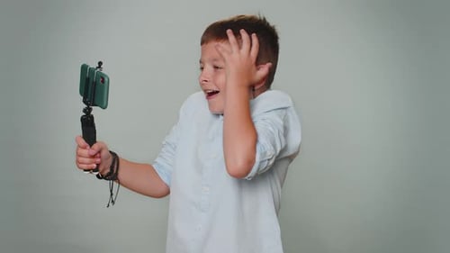 Boy Blogger Take Selfie on Mobile Phone Selfie Stick Communicate Video Call Online with Subscribers