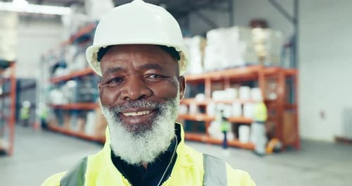 Industry, smile and face of black man in a warehouse for inventory, stock check or distribution