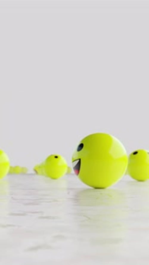 Rolling 3D Yellow Emoji Spheres Animation