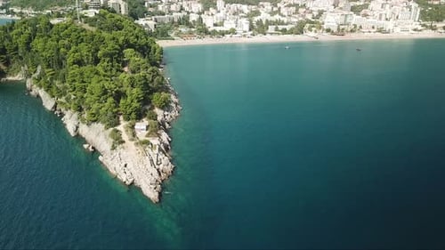 aerial view of scenic coastline in Adriatic Sea near Bečići town in the municipality of Budva, Monte