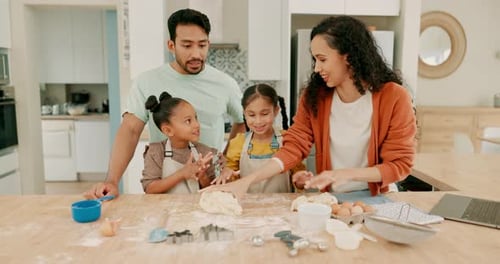 Family baking together in a brightly lit kitchen