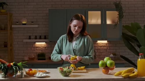 Woman Preparing Healthy Meal in Cozy Kitchen