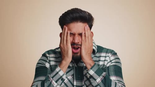 Man Showing Emotions of Stress and Confusion