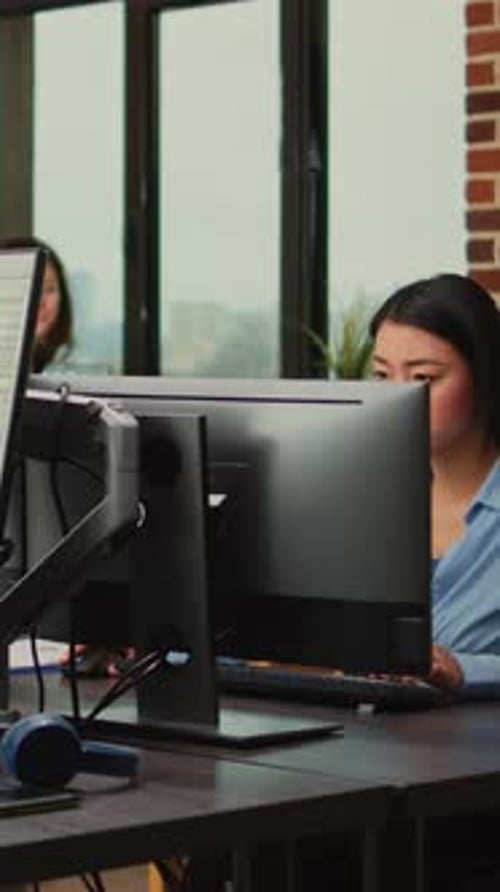Vertical Video Female Creative Engineer Using Game Programming Software