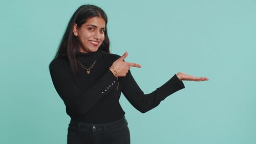 Indian Woman Showing Thumbs Up Pointing Empty Place Advertising Area for Commercial Text Copy Space