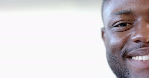 Close-up of an African American man smiling, with copy space