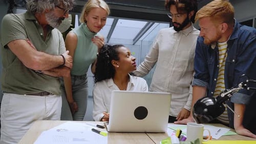 Diverse Team of Professional Business People Meeting in the Office Conference Room