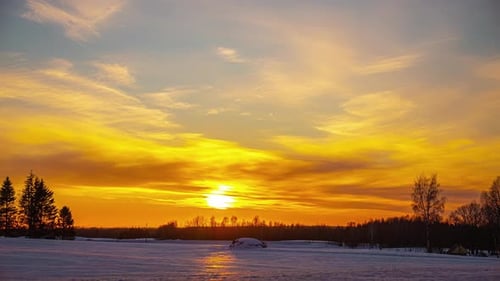 Winter Sunset Over Snow Field Time Lapse
