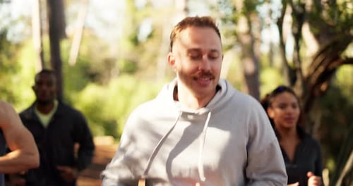Fitness, man and group running in forest for marathon challenge, endurance or pace training