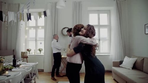 Family Together at Birthday Party in Decorated Home