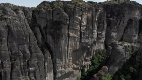 Close up Drone flight rock formation boulders pillars Meteora Region Day greece