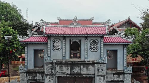 Aerial View of Traditional Asian Building in Urban Setting