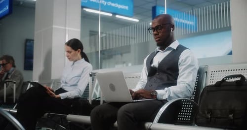 Airport Terminal Multiethnic Businesspeople Working with Digital Gadgets Waiting for Flight