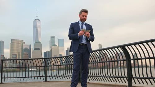 Business Man Hold Dollar Banknote Over New York City Dollar Notes Concept Credit and Loan in USA