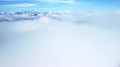 Flying Through Thick White Clouds