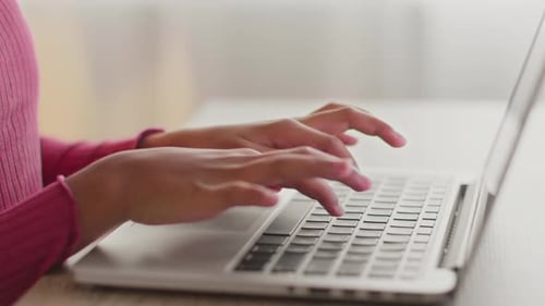 Typing on Laptop Keyboard Close Up